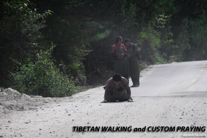 Tibetan on Road Praying Tibetan on Road Praying