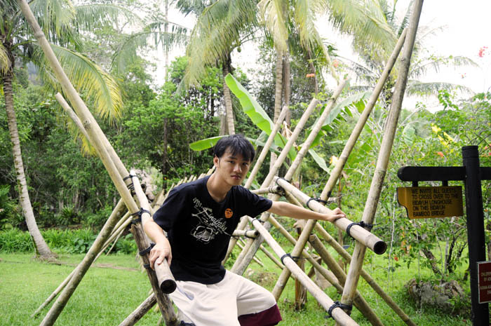 Daniel Chew on bamboo bridge