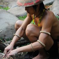 Man Lighting Up Fire using Sticks
